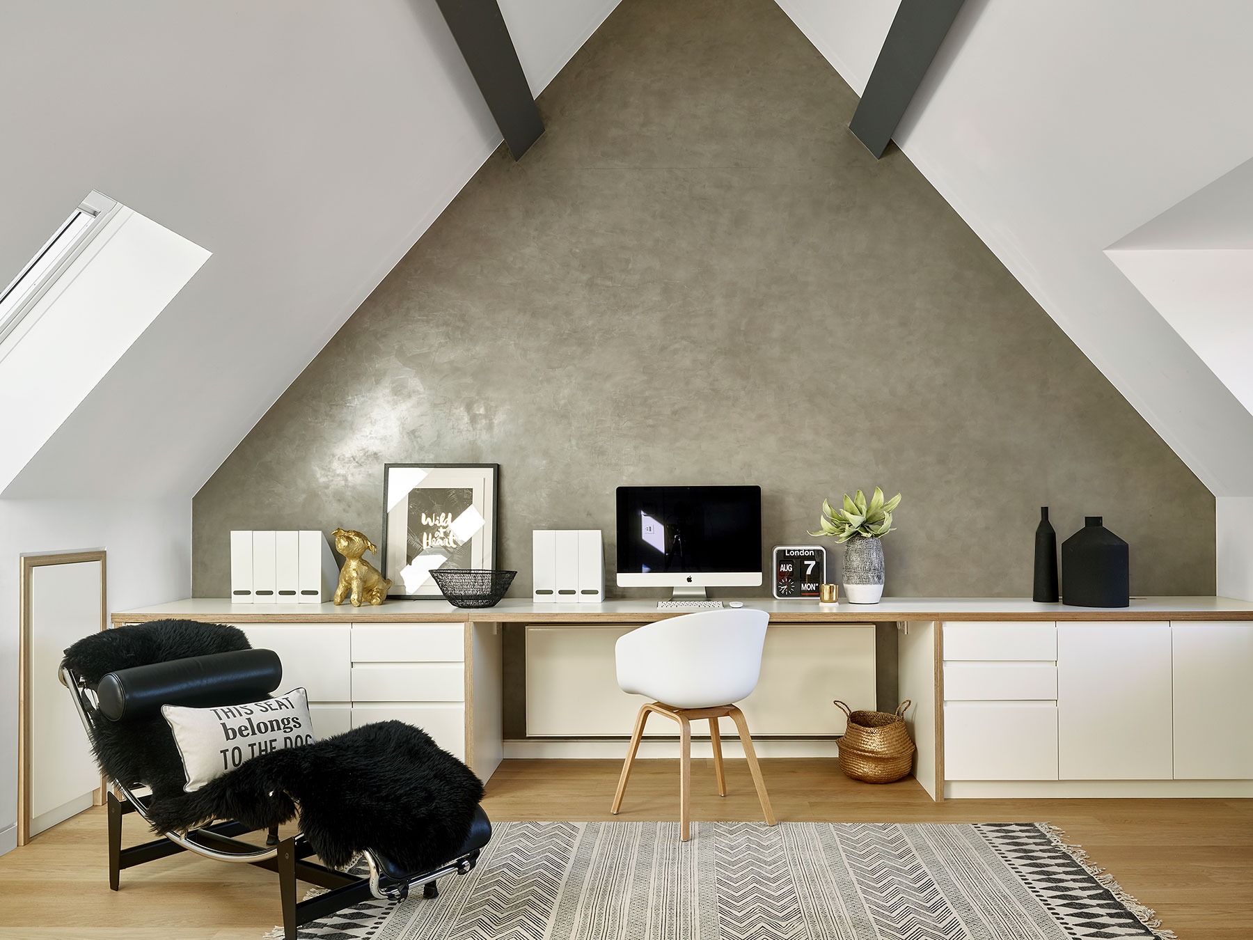 Home Office in Hampstrad, London. Ply construction with spray finish detailing, featuring generous storage in the integrated cupboards and drawers.