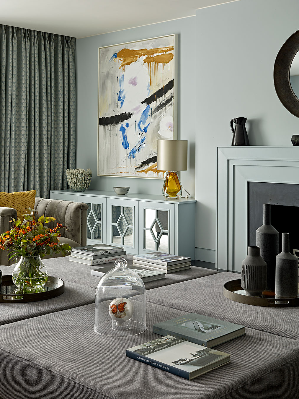 The units feature custom complimentary colour and detailed beading to frame the feature mirrors.